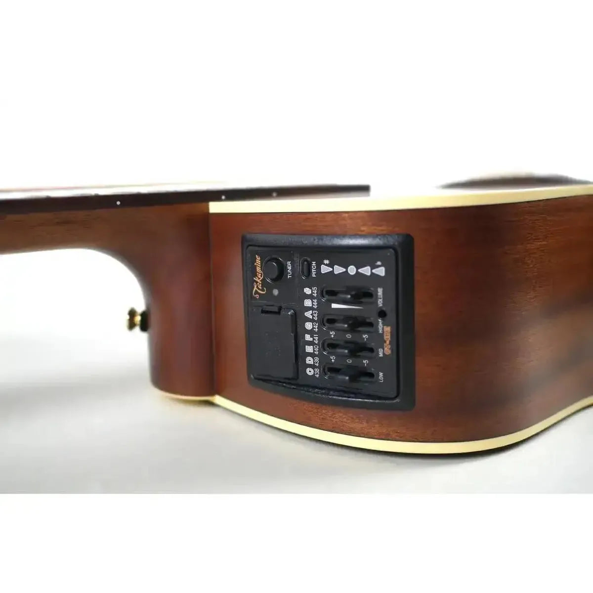 Takamine P3DC-12 12-string acoustic-electric guitar's dark wood body with CT-4BII preamp and tuner.