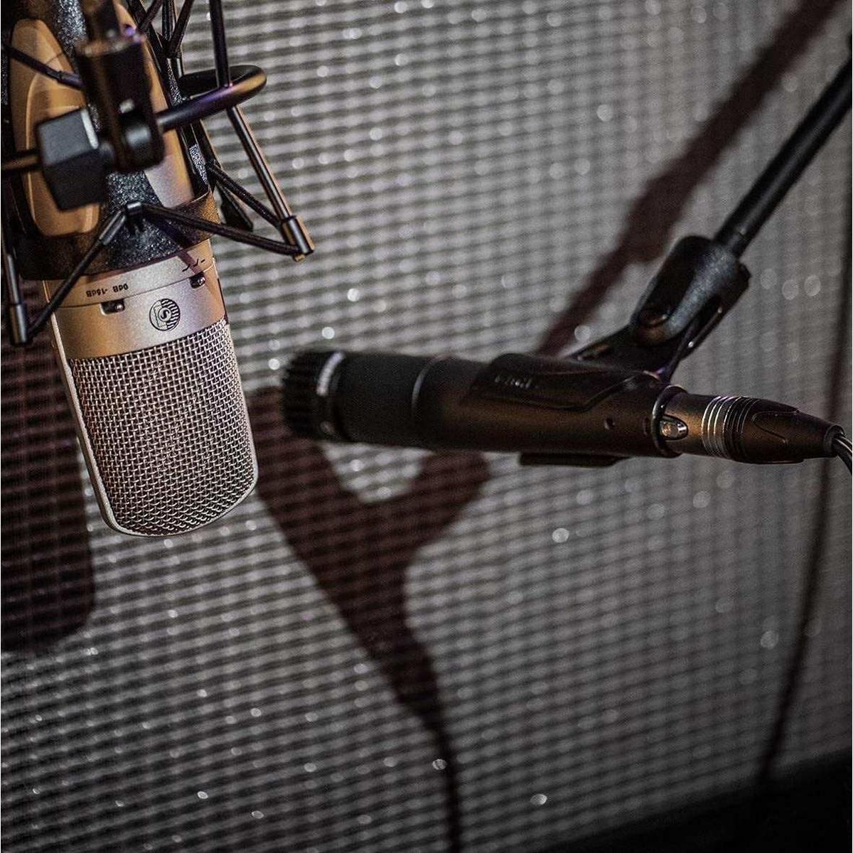 Shure SM57 on a mic stand in a studio