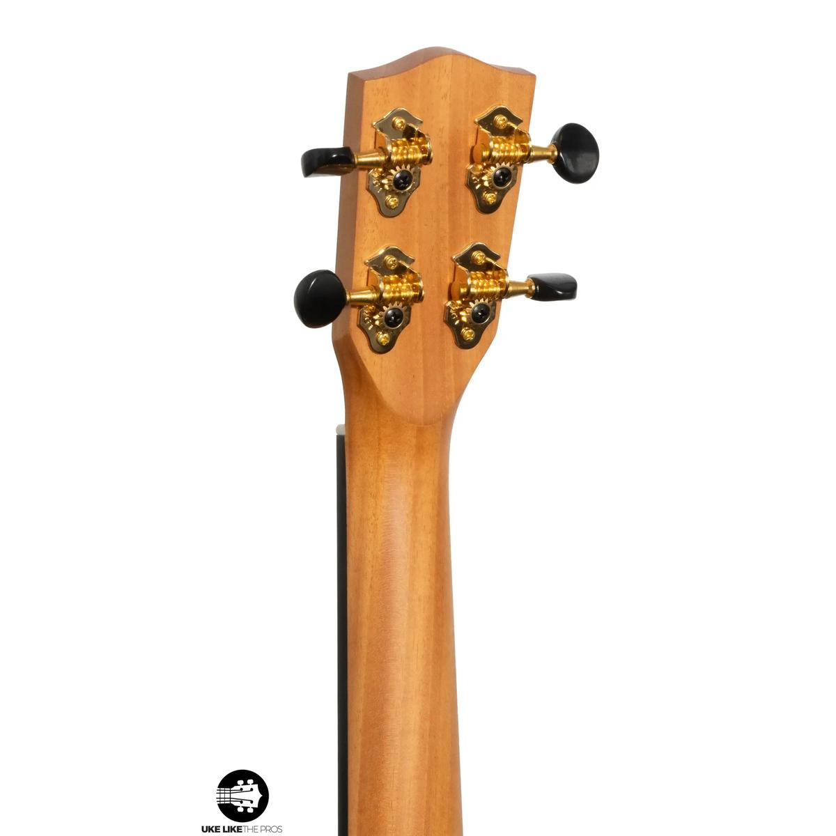 Pono MGCDP headstock back showing the mahogany neck and gold Grover tuners
