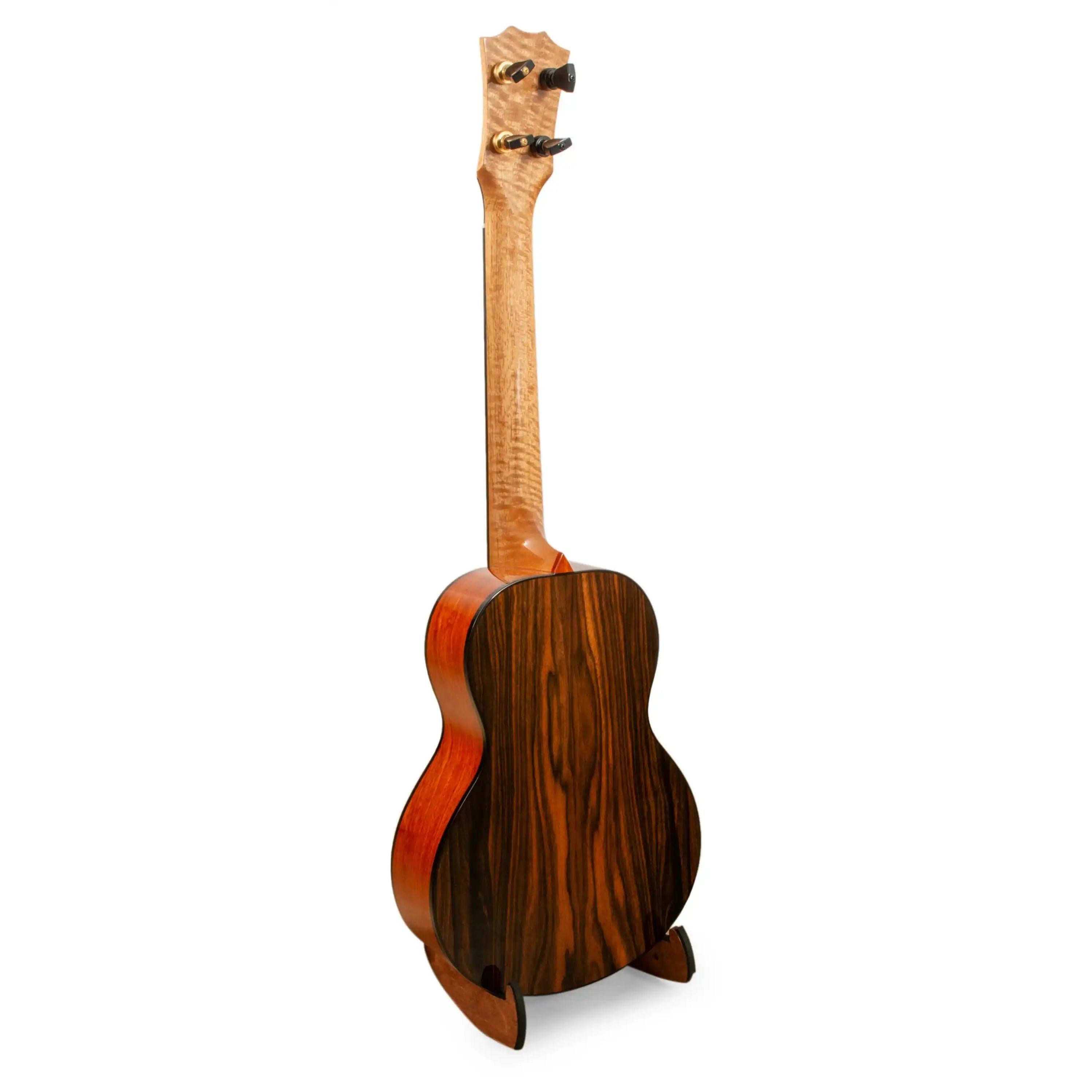 Rear view of ukulele with figured wood neck and dark wood back, Terry Carter Music Store