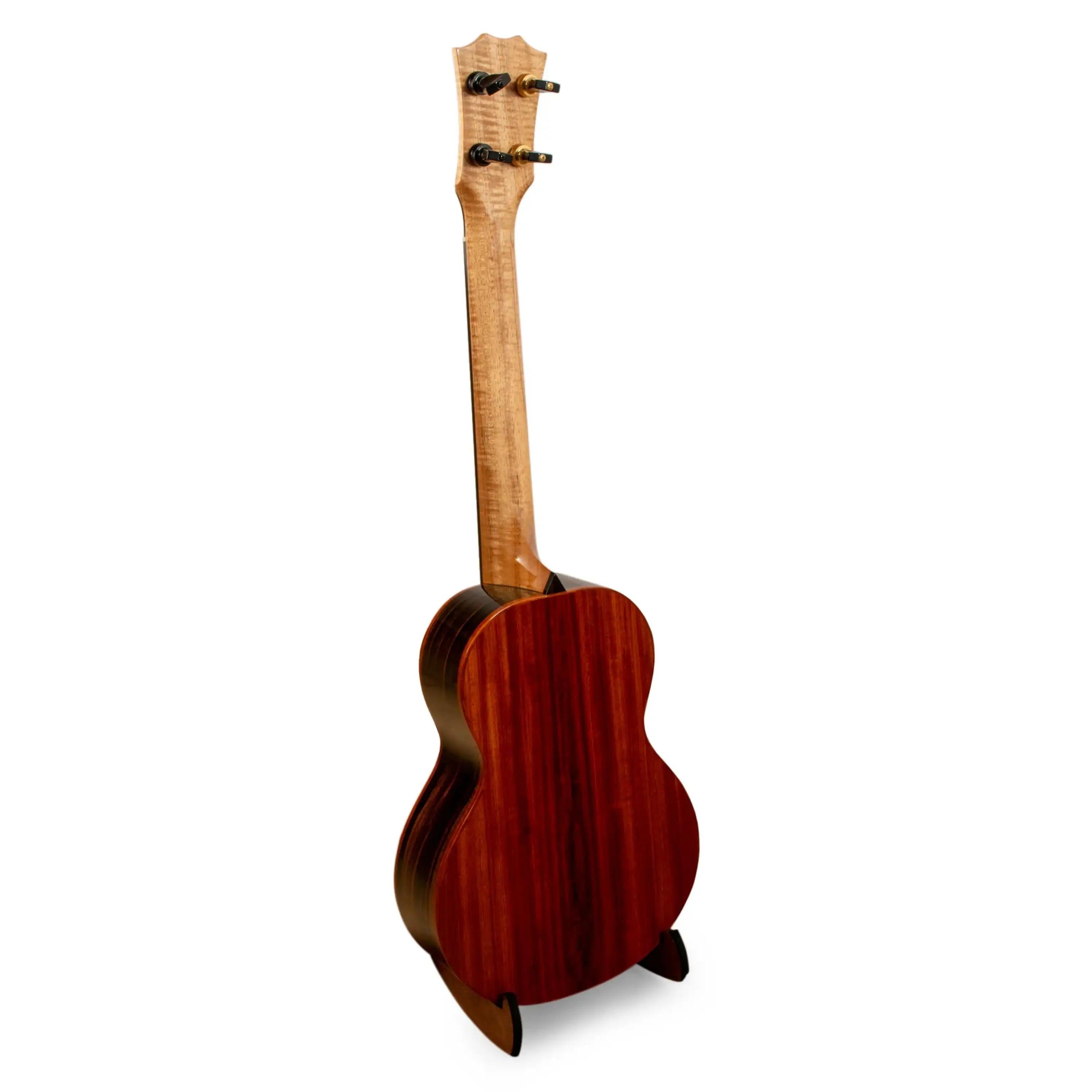 Back view of Romero Creations ukulele with figured maple neck and rich rosewood body at Terry Carter Music Store