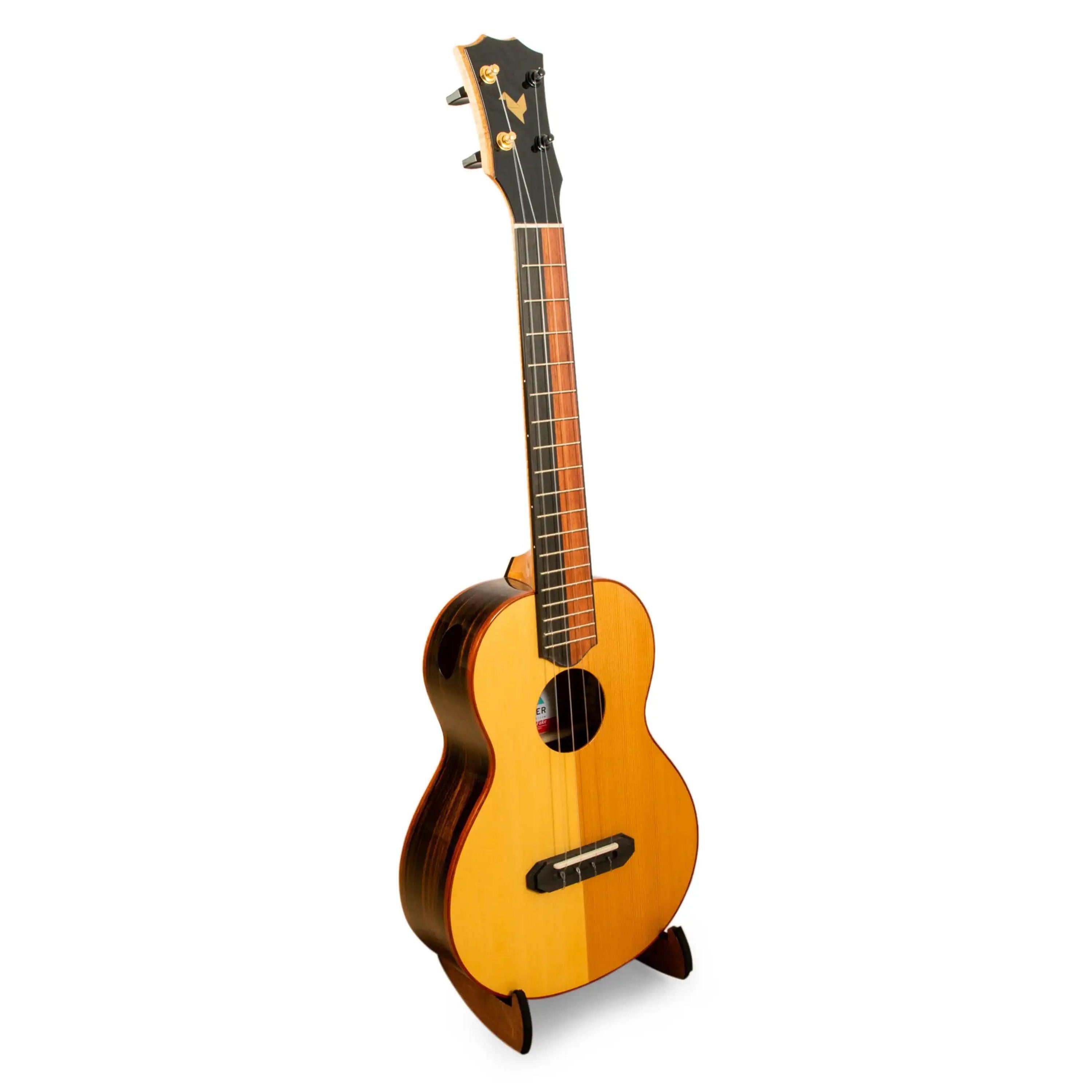 Romero Creations Daito ukulele with spruce and rosewood body on stand at Terry Carter Music Store